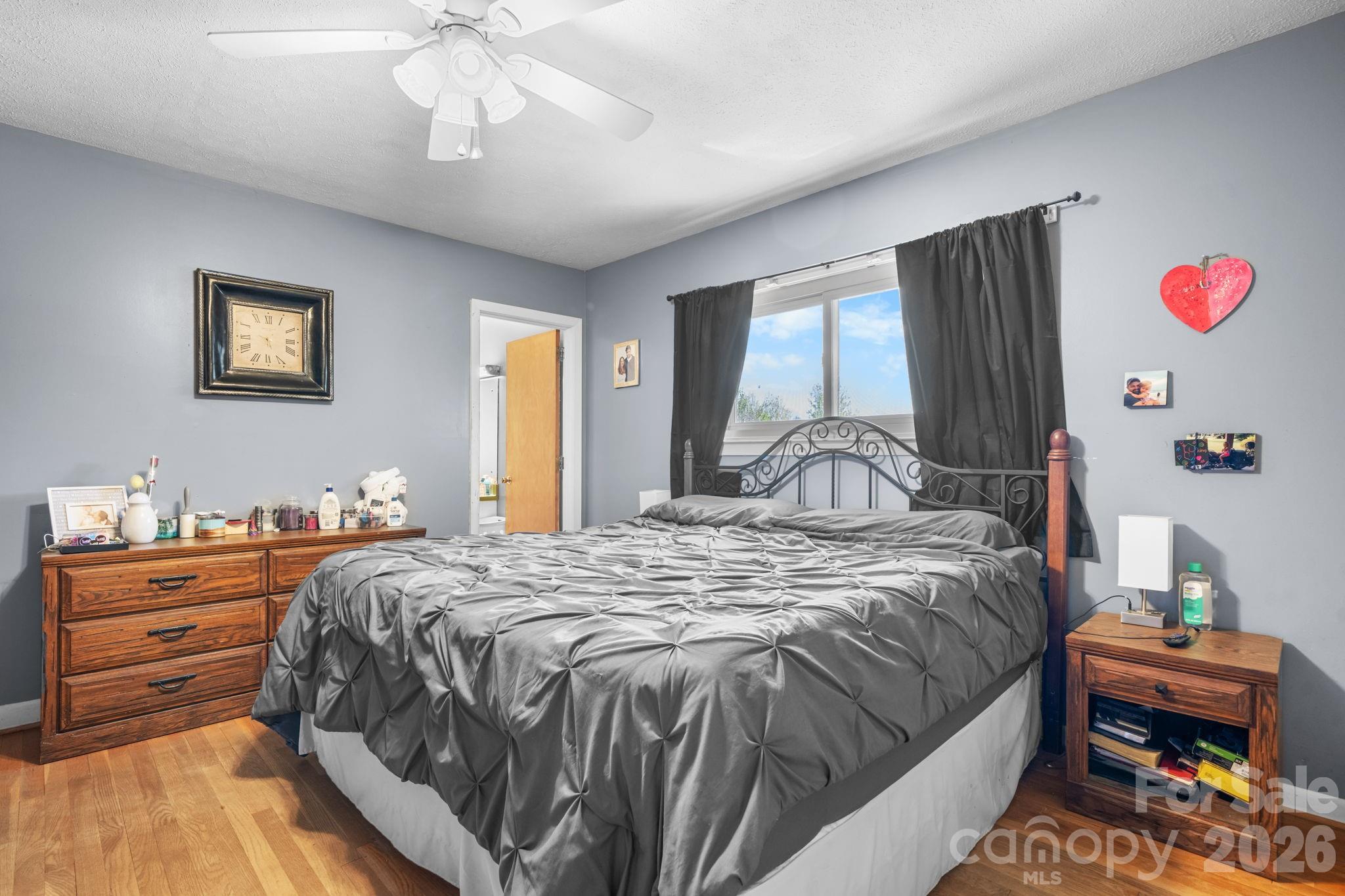 103 Hamp Street Morganton, NC 28655 - Photo 13 of 42 a bedroom with bed and window