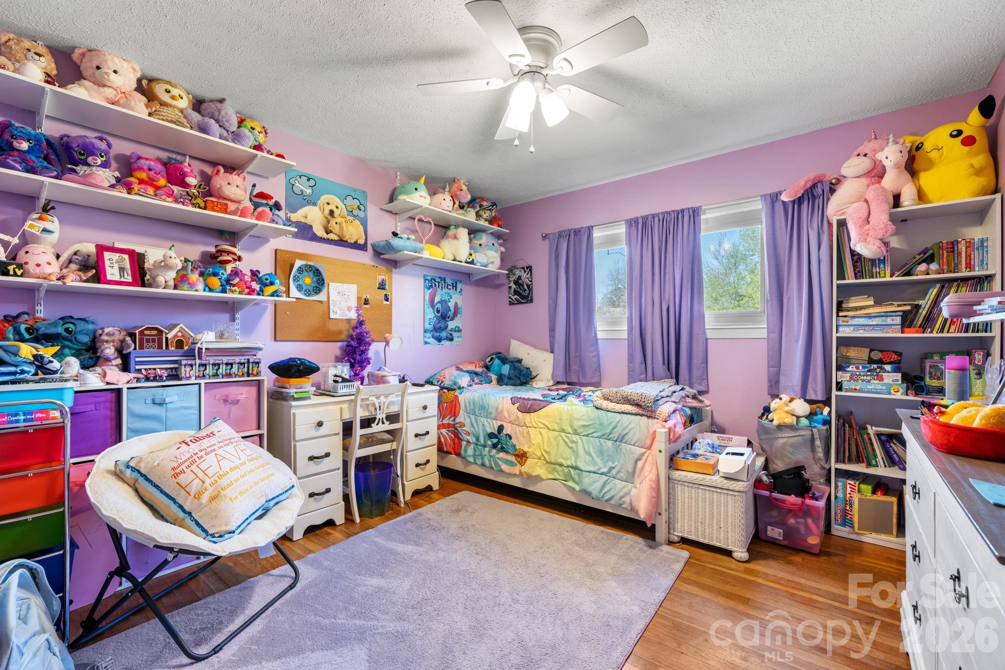 103 Hamp Street Morganton, NC 28655 - Photo 16 of 42 a bedroom with a bed and a window