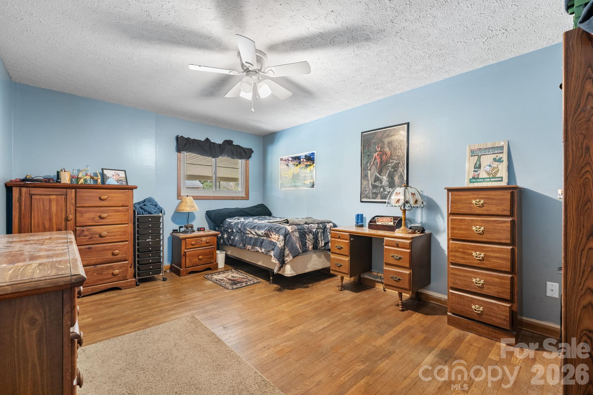 103 Hamp Street Morganton, NC 28655 - Photo 18 of 42 a bedroom with a bed and furniture