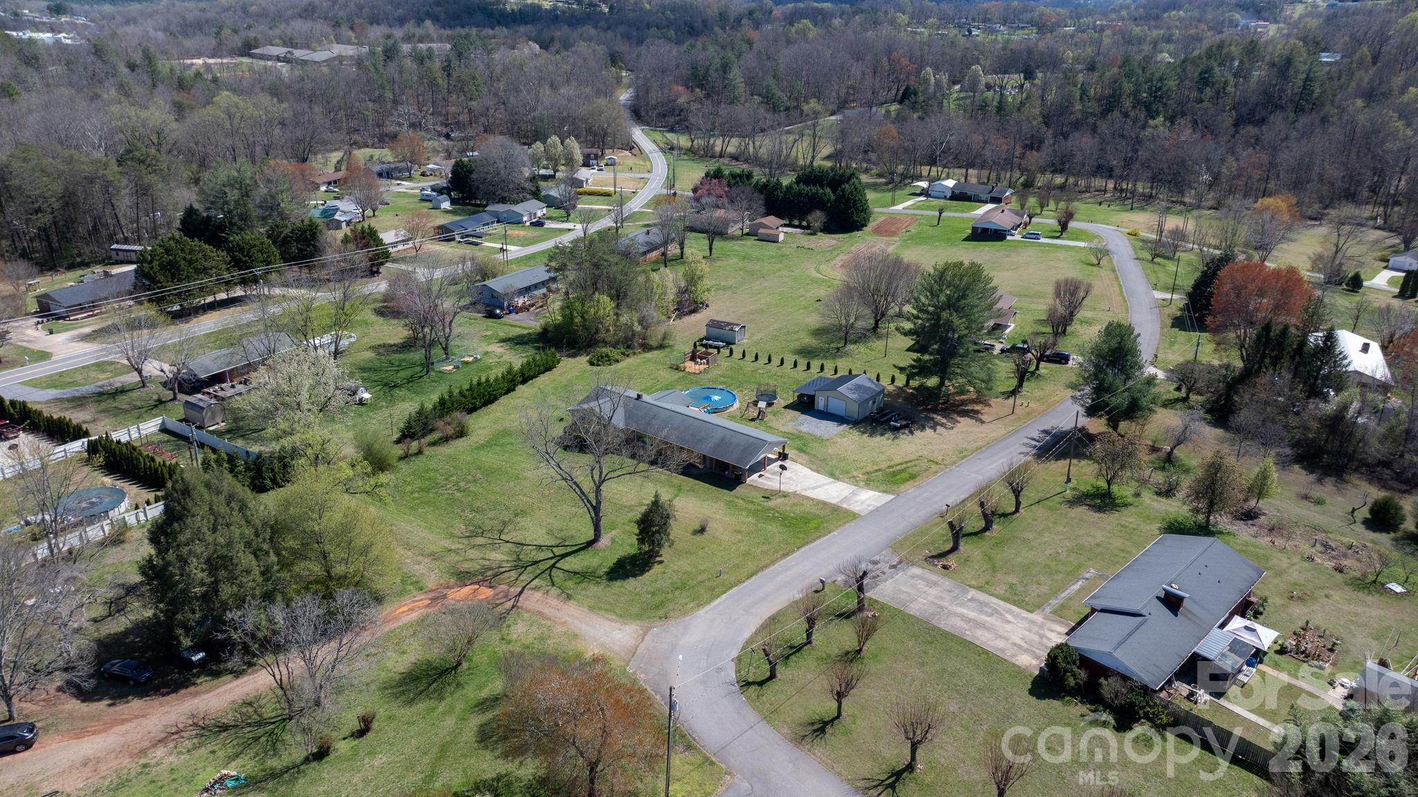 103 Hamp Street Morganton, NC 28655 - Photo 2 of 42 an aerial view of a house with a yard and lake view