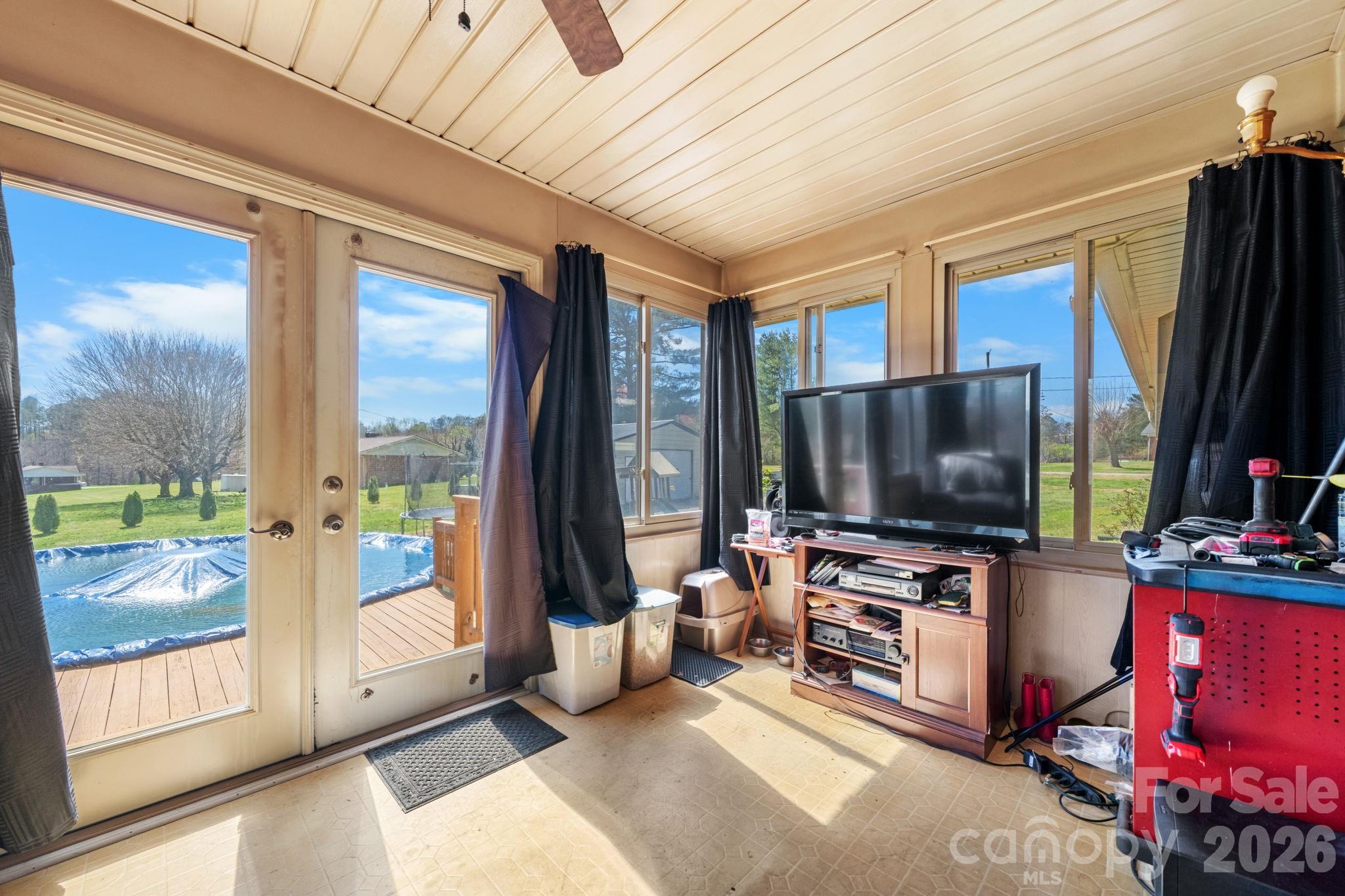 103 Hamp Street Morganton, NC 28655 - Photo 21 of 42 a living room with furniture and a flat screen tv