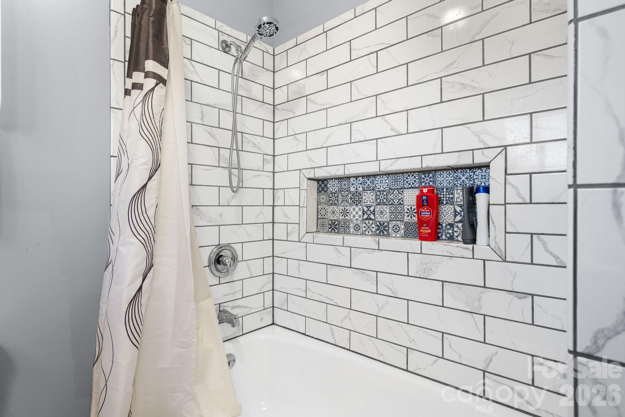 103 Hamp Street Morganton, NC 28655 - Photo 25 of 42 a bathroom with a shower