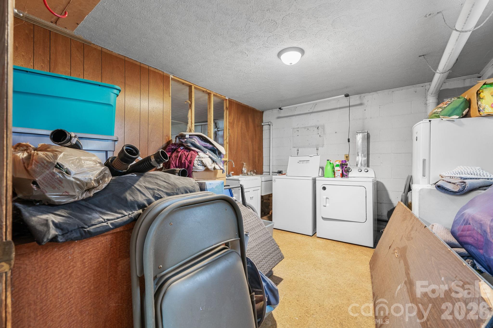 103 Hamp Street Morganton, NC 28655 - Photo 29 of 42 a bedroom with a bed and cabinets