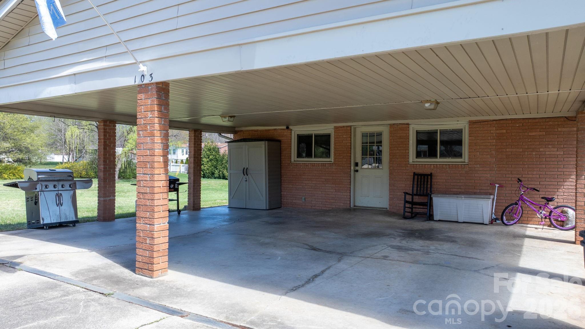 103 Hamp Street Morganton, NC 28655 - Photo 35 of 42 a view of a porch with seating space