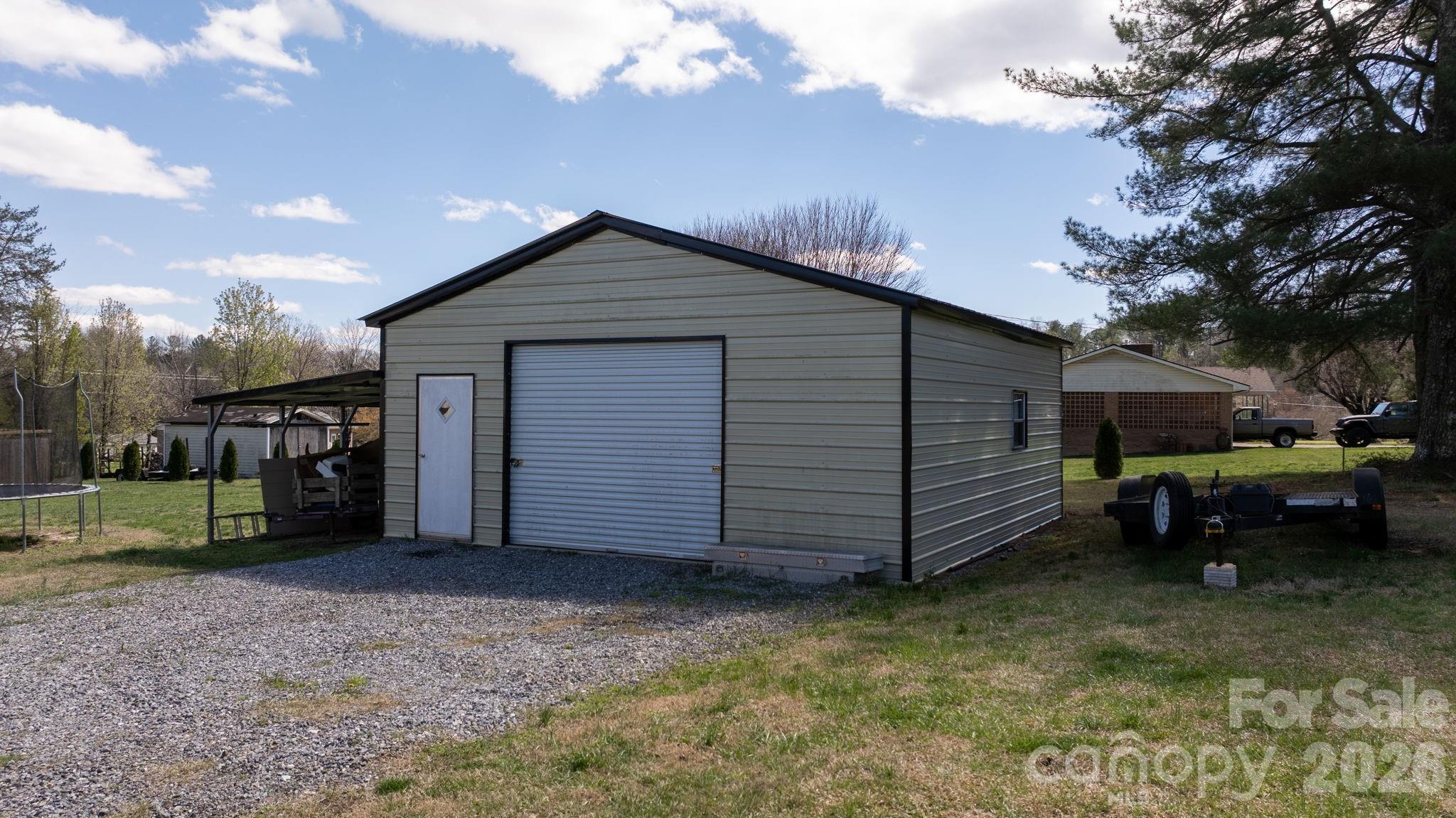 103 Hamp Street Morganton, NC 28655 - Photo 36 of 42 a view of a house with a backyard