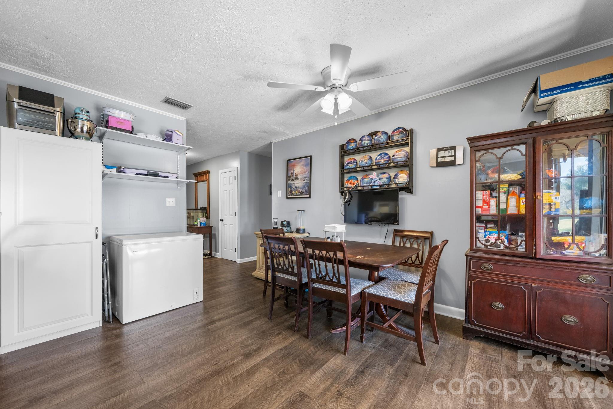 103 Hamp Street Morganton, NC 28655 - Photo 9 of 42 a view of a dining room with furniture and wooden floor