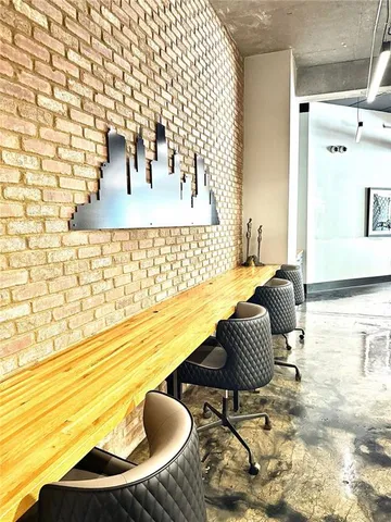 a view of balcony with chair and table