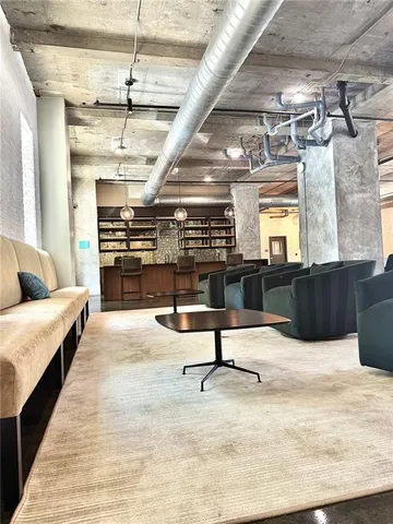 a view of a livingroom with furniture