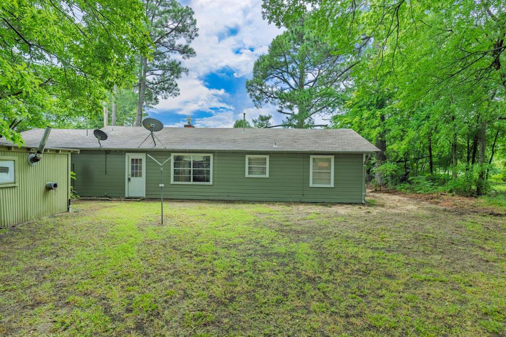 122 Fm 275 Emory, TX 75440 - Photo 24 of 38 a front view of a house with a garden
