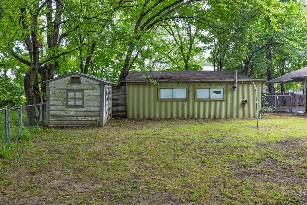 122 Fm 275 Emory, TX 75440 - Photo 25 of 38 a front view of a house with a garden