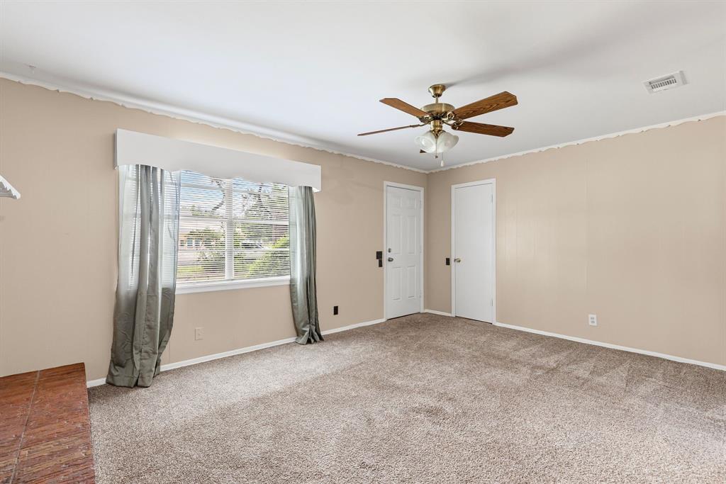 122 Fm 275 Emory, TX 75440 - Photo 7 of 38 an empty room with windows and fan