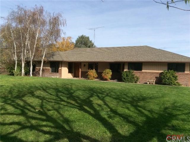 This lovely ranch style home with hip roof was originally built in 1979.  New roof installed in 1998.  Kitchen and baths were updated in 2005. 4.551 kW Photovoltaic System (owned) installed for the main house Aug. 2008,  New FAG & Central Air installed i