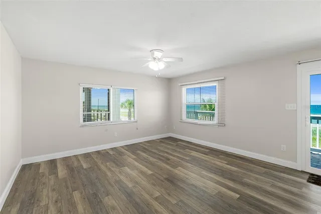 a view of a kitchen with a sink and a window