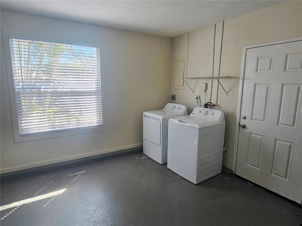 7000 Brentford Road Sarasota, FL 34241 - Photo 29 of 29 a utility room with dryer and washer