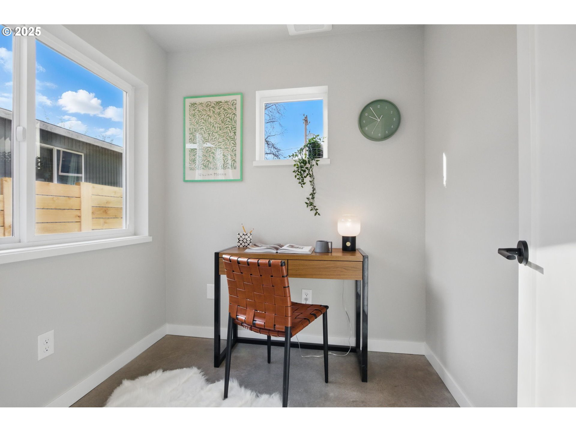 1123 Southeast Rhone Street, Unit B Portland, OR 97202 - Photo 8 of 22 a view of a room with a table and chairs