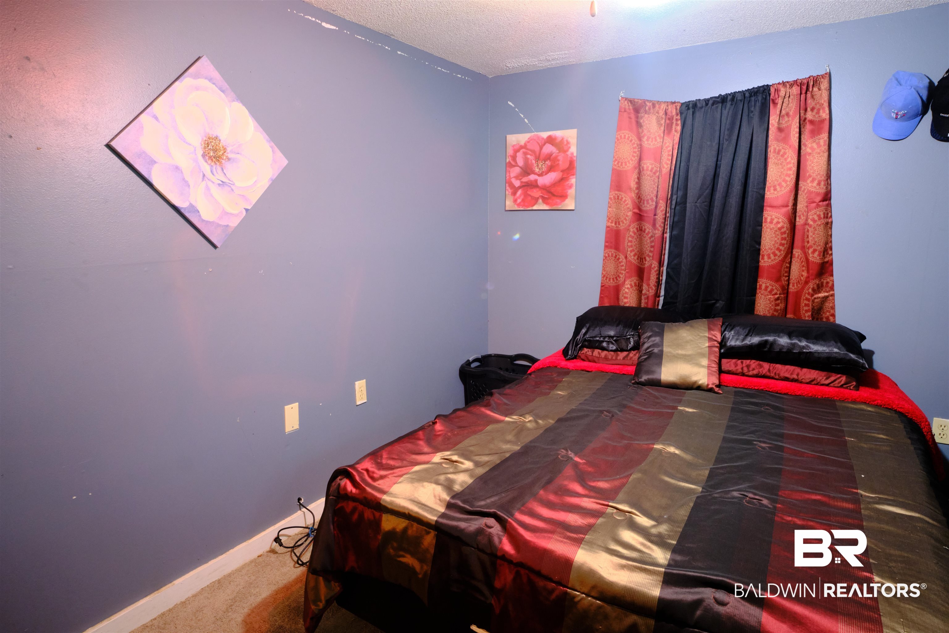 101 West Horner Street Atmore, AL 36502 - Photo 36 of 38 Carpeted bedroom with a textured ceiling