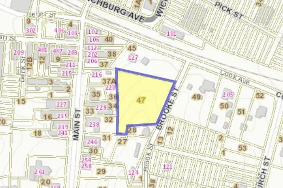 a view of a fireplace with a book and a table