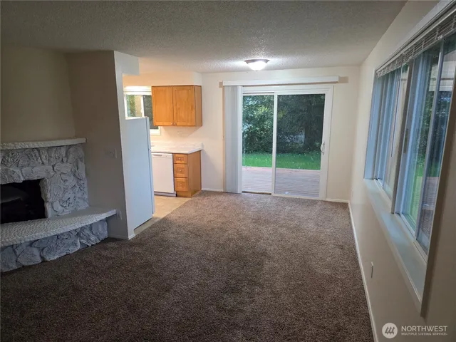 a view of empty room with front door
