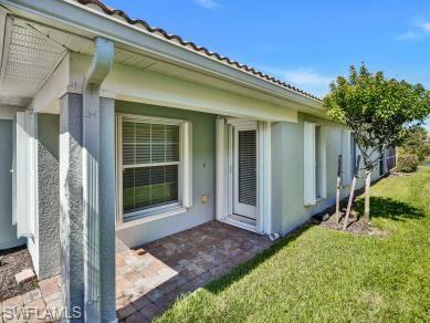 8693 Querce Court Naples, FL 34114 - Photo 2 of 50 a view of a backyard with a garden and plants
