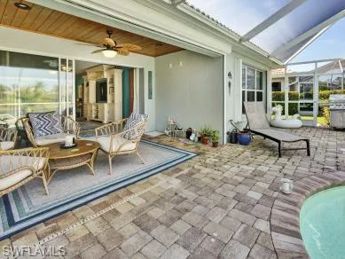 a outdoor space with lots of furniture and windows