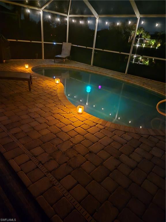 8693 Querce Court Naples, FL 34114 - Photo 27 of 50 a bathroom with a shower