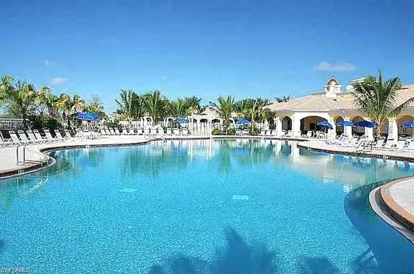 a view of a lake with house swimming pool and outdoor space