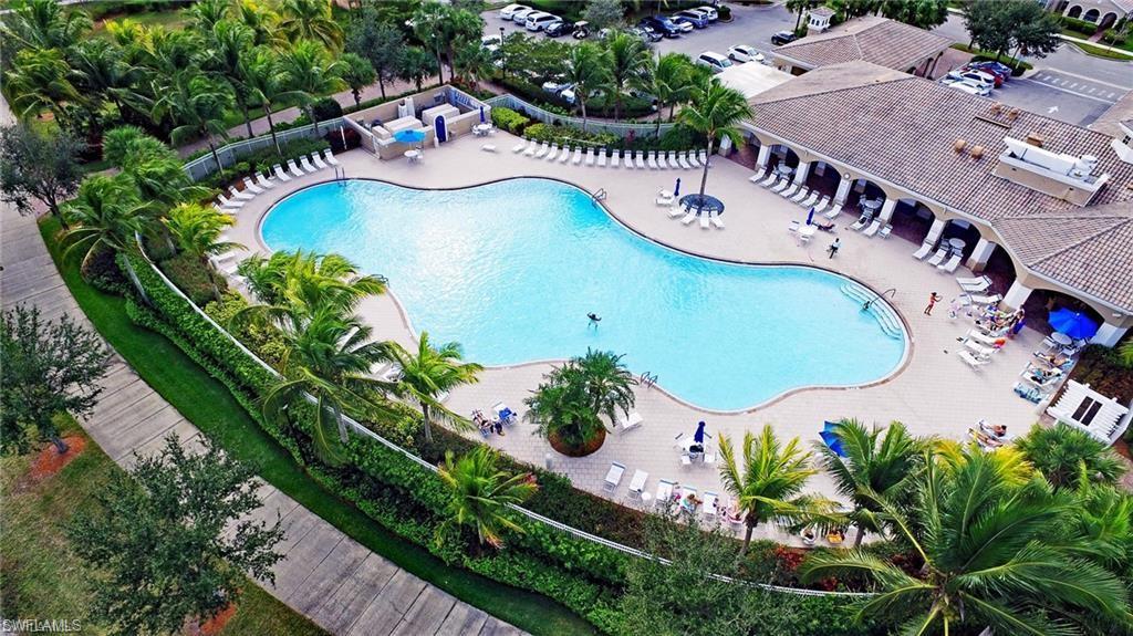 8693 Querce Court Naples, FL 34114 - Photo 48 of 50 an aerial view of a swimming pool and outdoor space