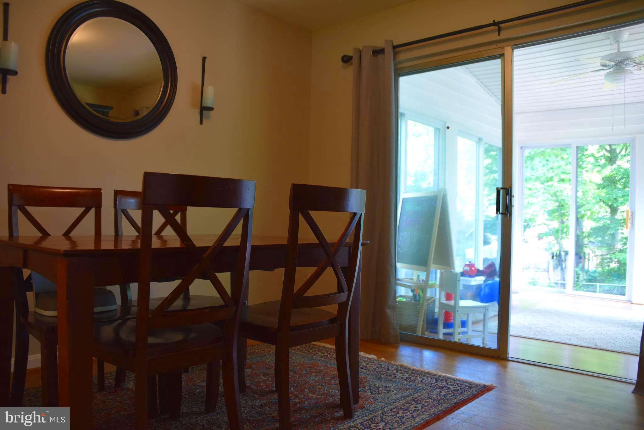 8605 Cromwell Drive Springfield, VA 22151 - Photo 11 of 24 Separate Dining Room w/ Doors to Glass Sunroom