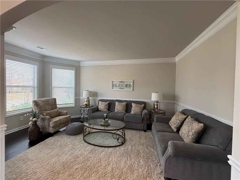 3459 In Bloom Way Auburn, GA 30011 - Photo 5 of 35 a living room with furniture and a window