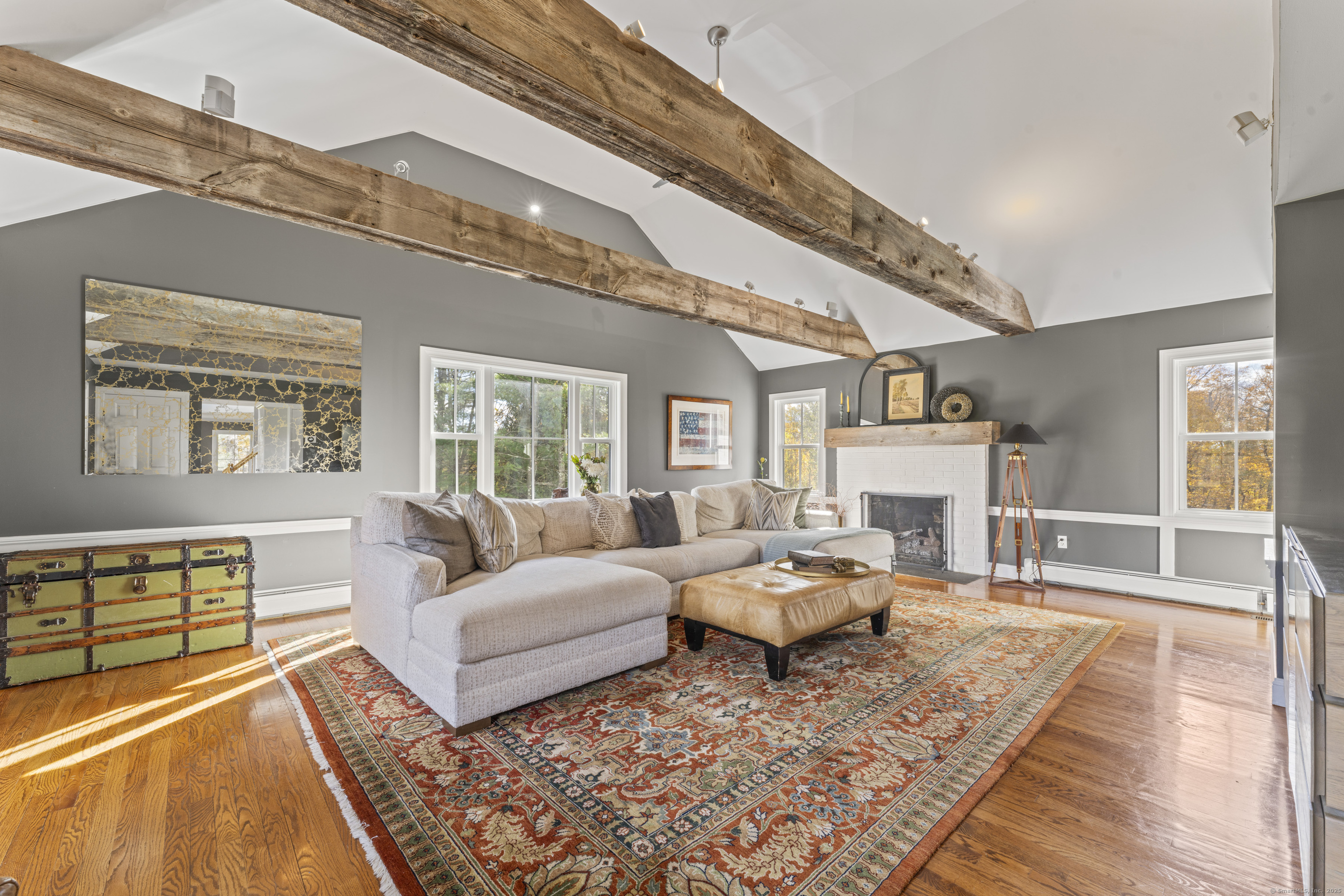 40 Great Ring Road Newtown, CT 06482 - Photo 11 of 39 a living room with furniture and a fireplace