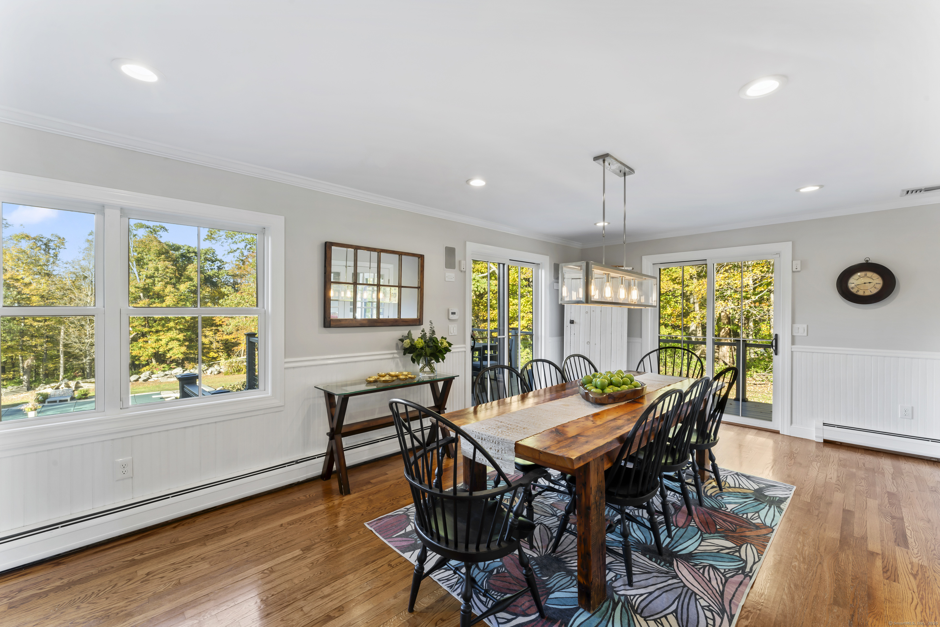 40 Great Ring Road Newtown, CT 06482 - Photo 13 of 39 a view of a dining room with furniture window and wooden floor