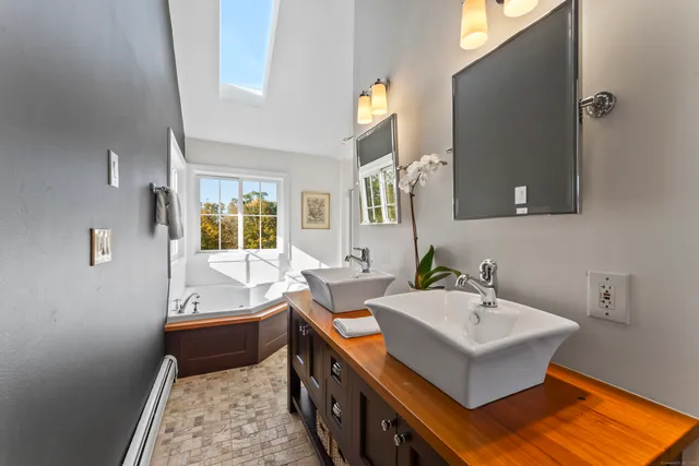 a view of a bath tub sitting in a bathroom