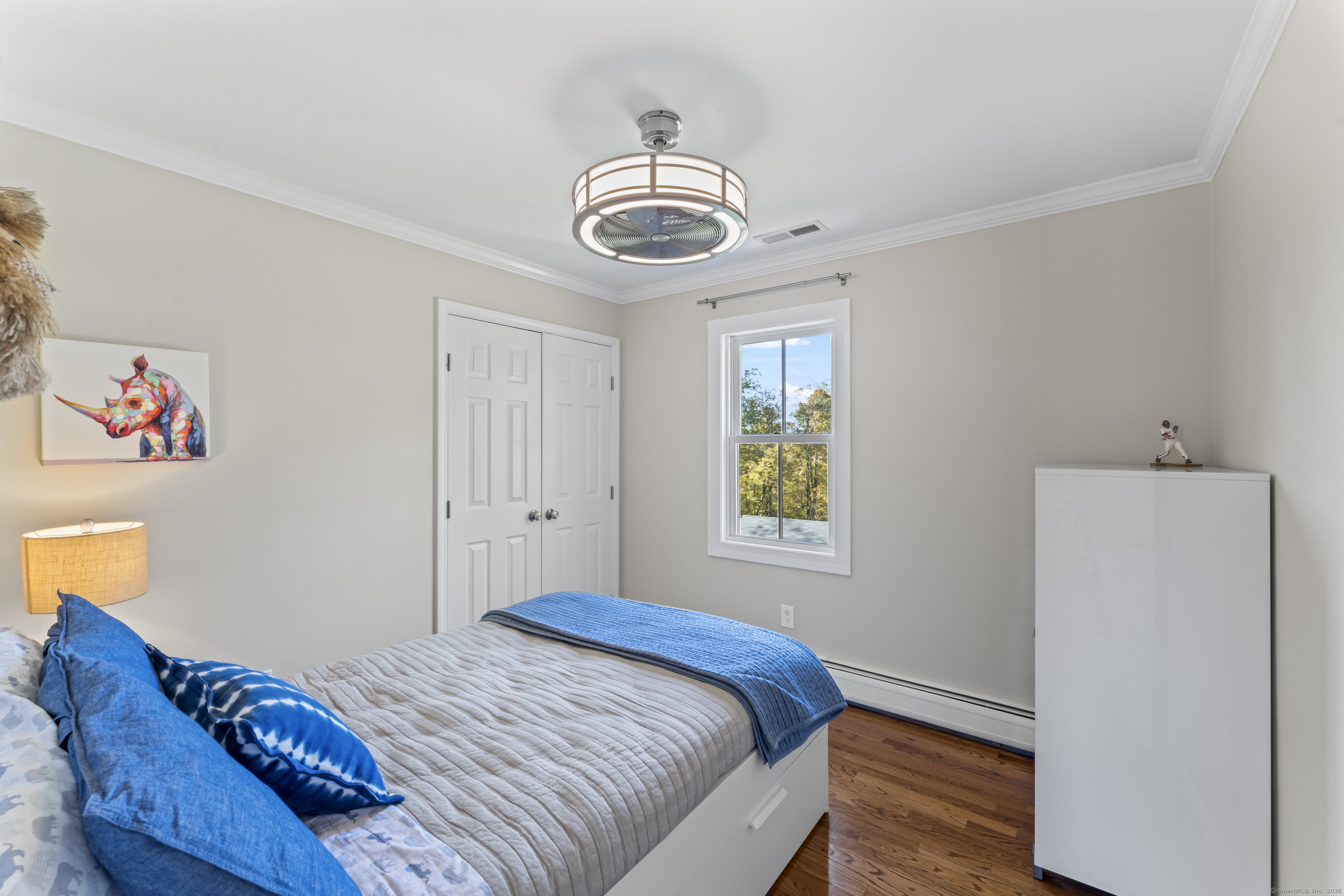 40 Great Ring Road Newtown, CT 06482 - Photo 21 of 39 a bedroom with a bed and a window