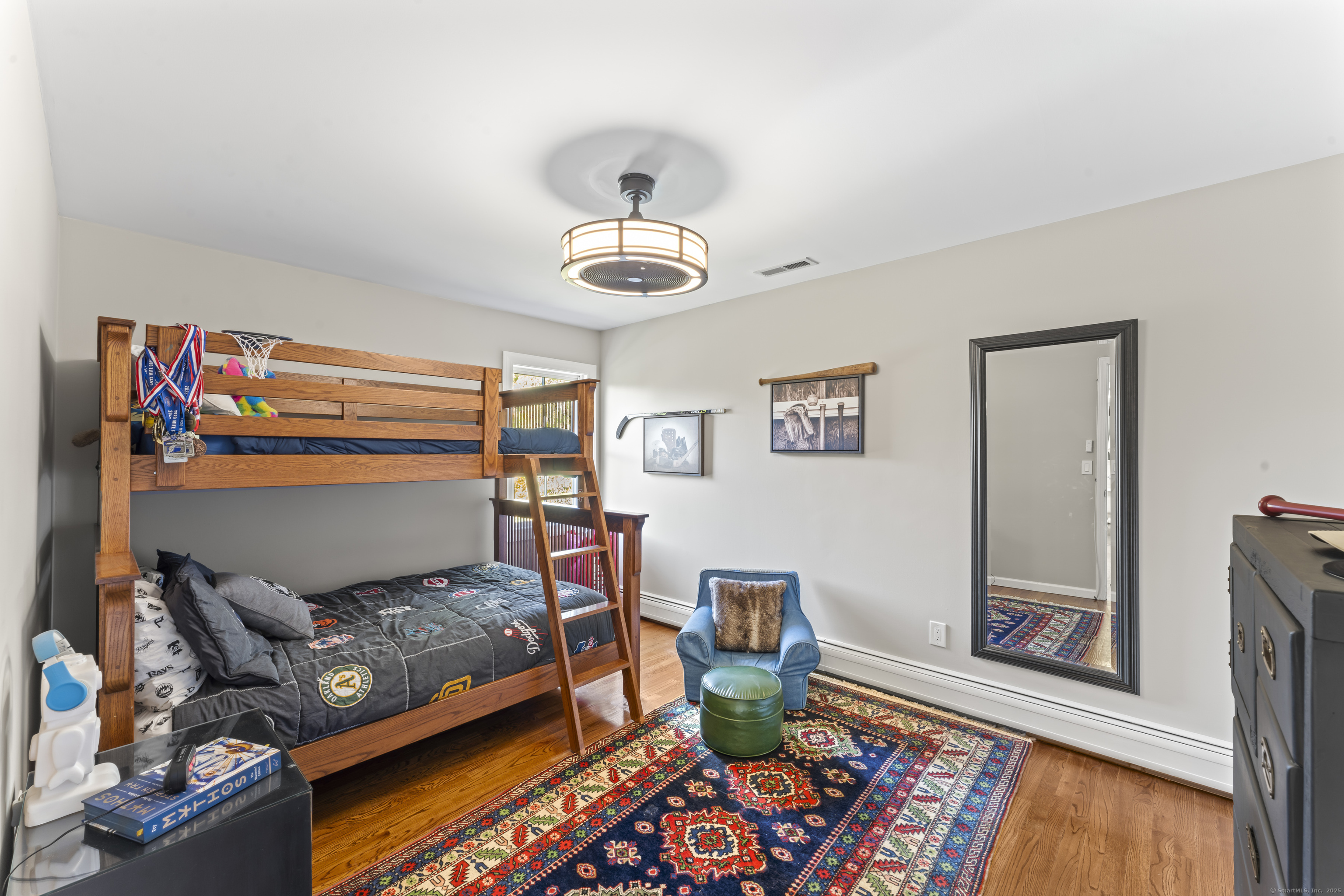 40 Great Ring Road Newtown, CT 06482 - Photo 22 of 39 a living room with furniture and a rug