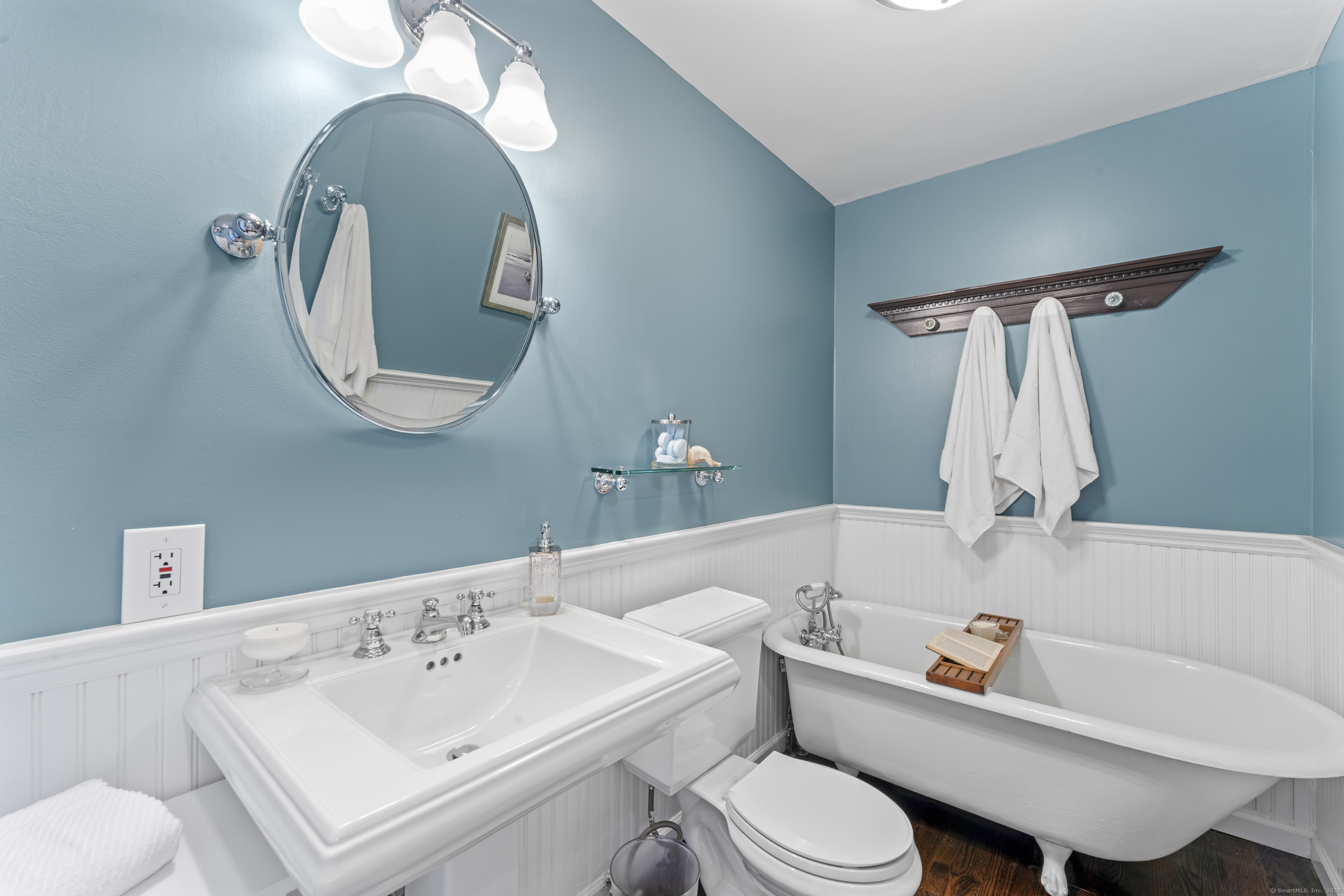 40 Great Ring Road Newtown, CT 06482 - Photo 23 of 39 a bathroom with a sink toilet and a mirror