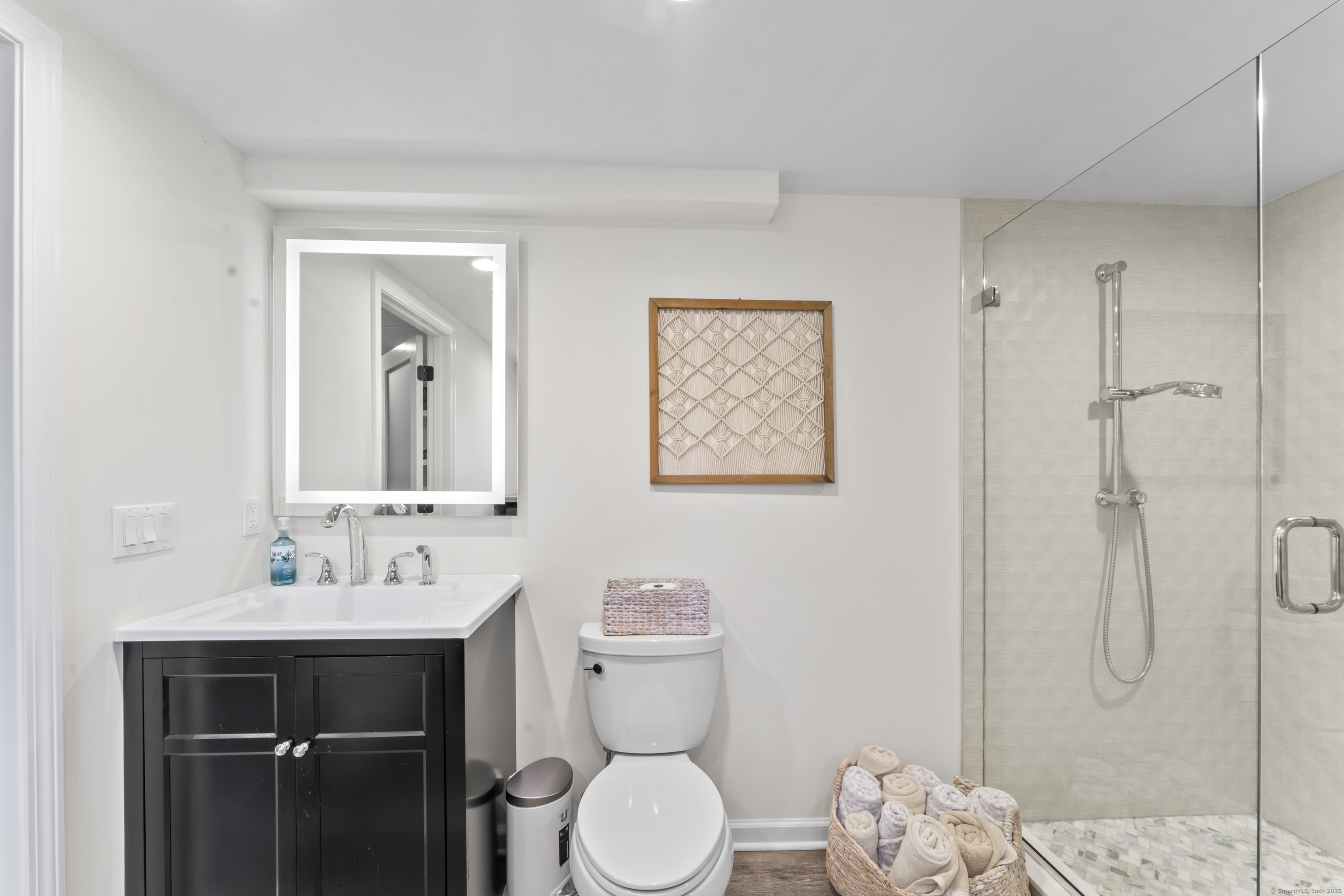 40 Great Ring Road Newtown, CT 06482 - Photo 26 of 39 a bathroom with a sink toilet and shower