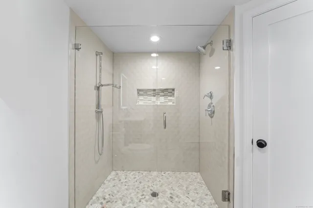 a view of a chairs and table on the wooden floor