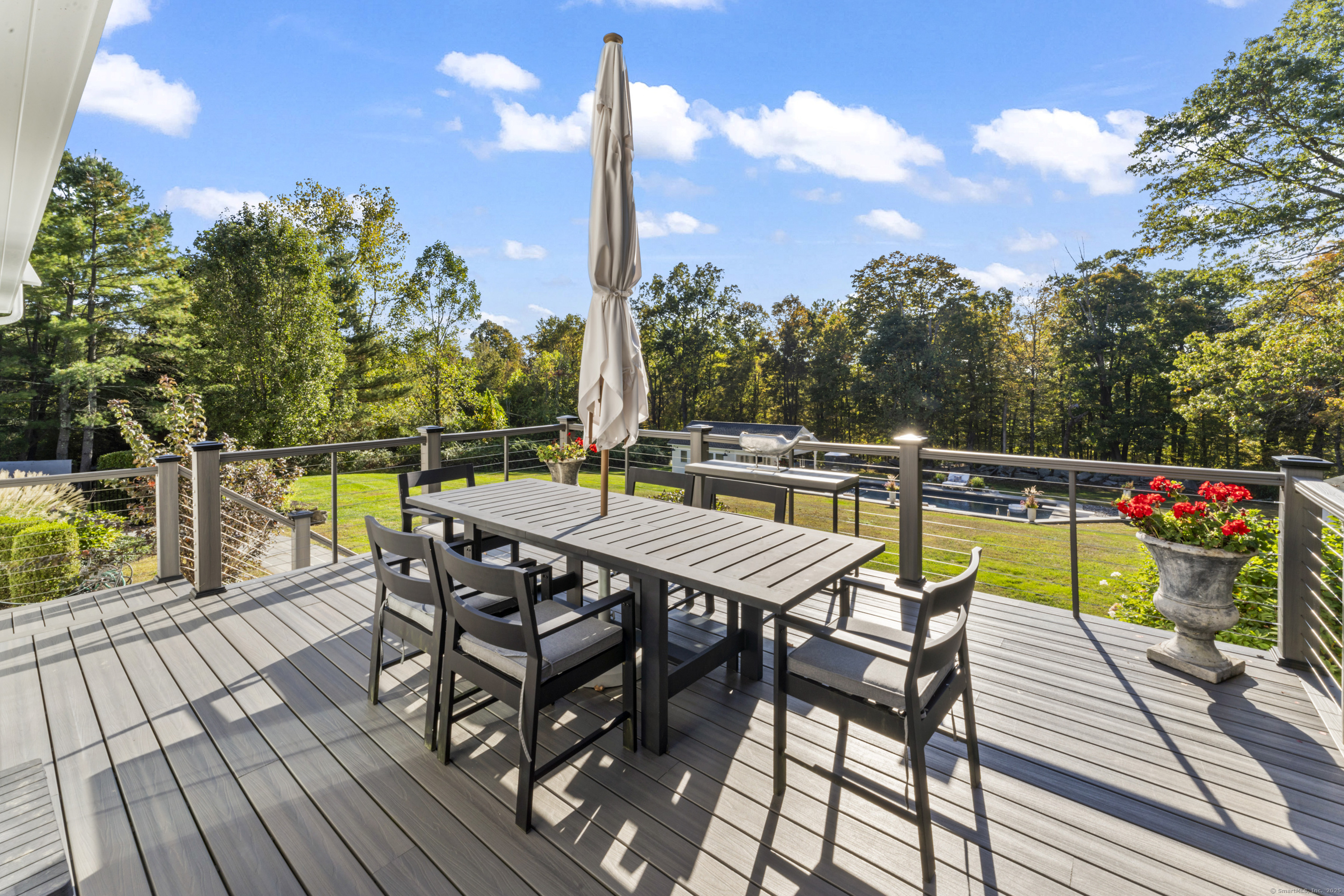 40 Great Ring Road Newtown, CT 06482 - Photo 28 of 39 a view of a chairs and table on the wooden floor