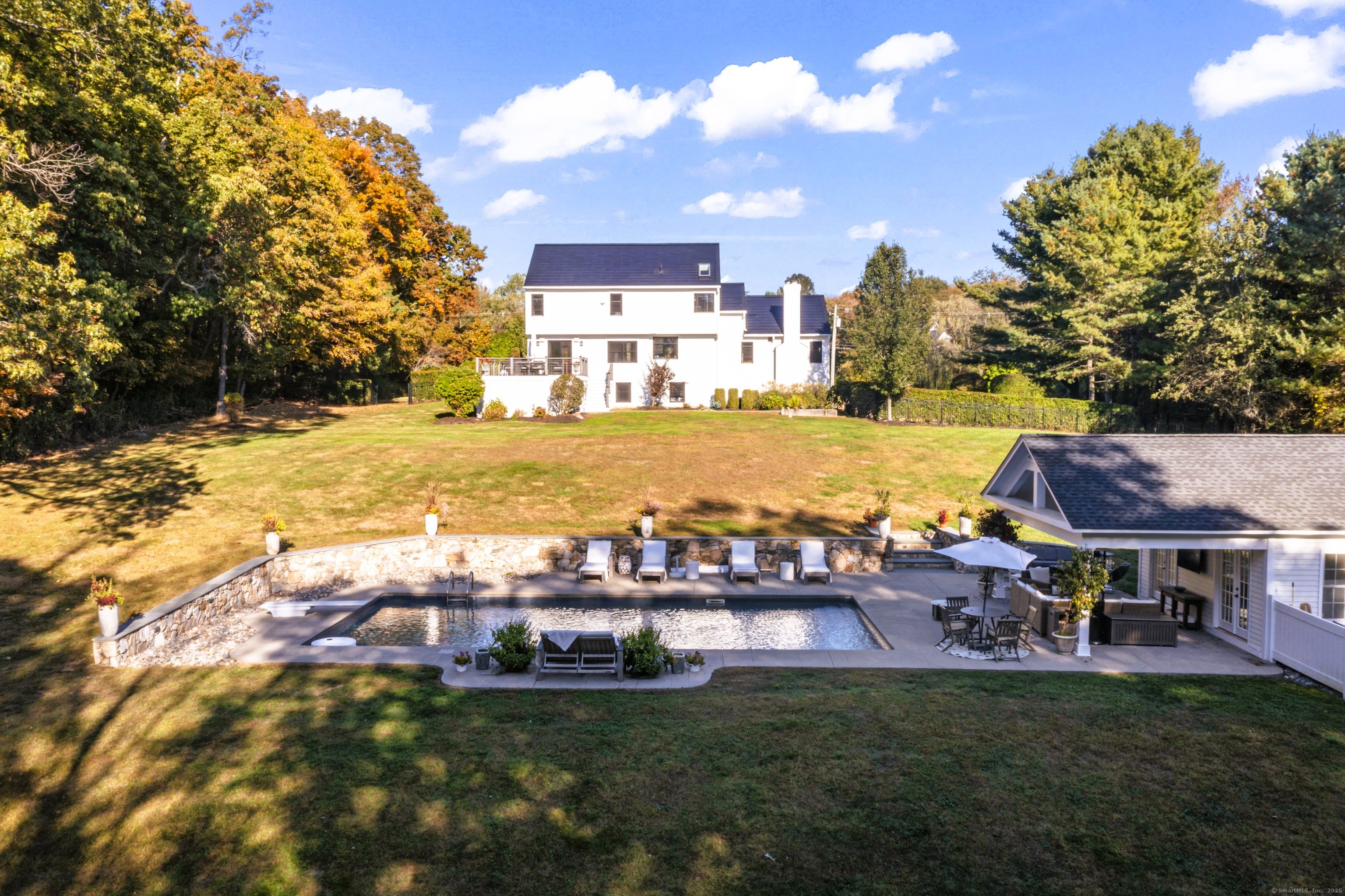 40 Great Ring Road Newtown, CT 06482 - Photo 29 of 39 a view of a lake with a city