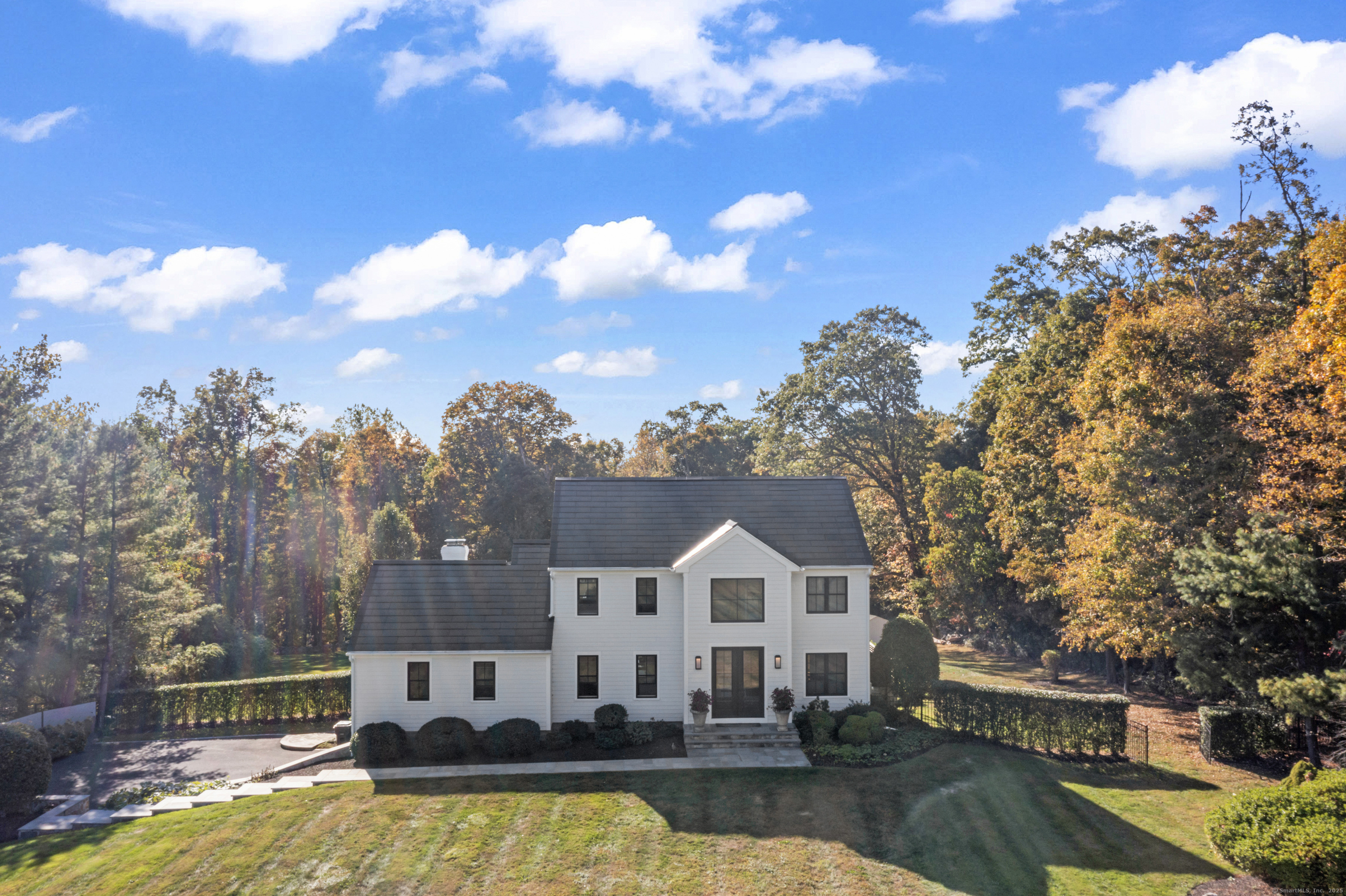 40 Great Ring Road Newtown, CT 06482 - Photo 3 of 39 a view of a house with swimming pool next to a yard