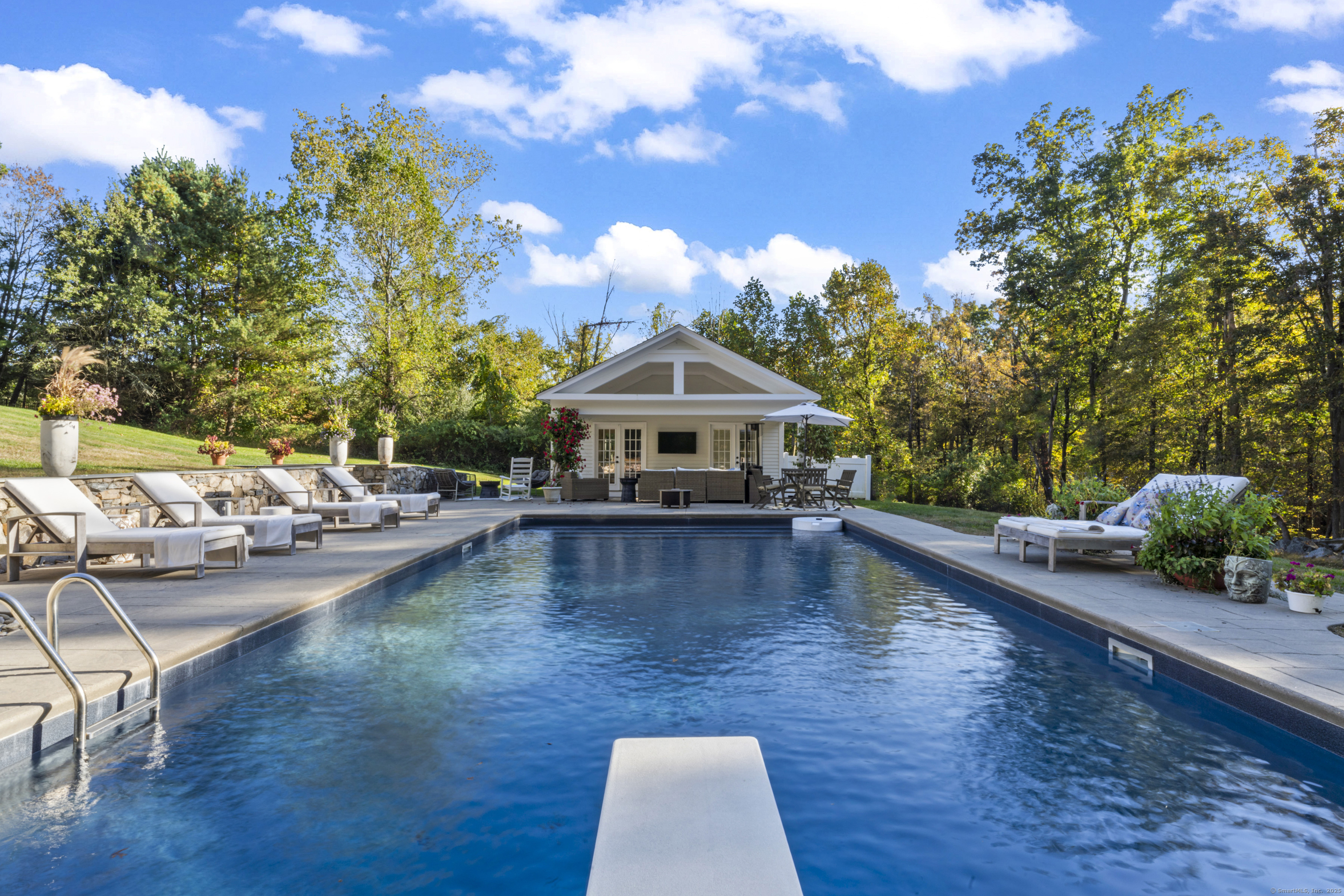 40 Great Ring Road Newtown, CT 06482 - Photo 34 of 39 a front view of a house with swimming pool
