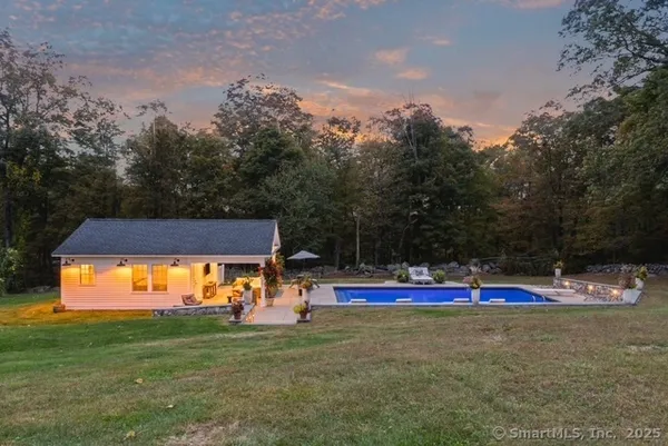 a view of outdoor space with yard and outdoor seating