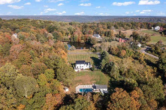 an aerial view of residential building with parking space