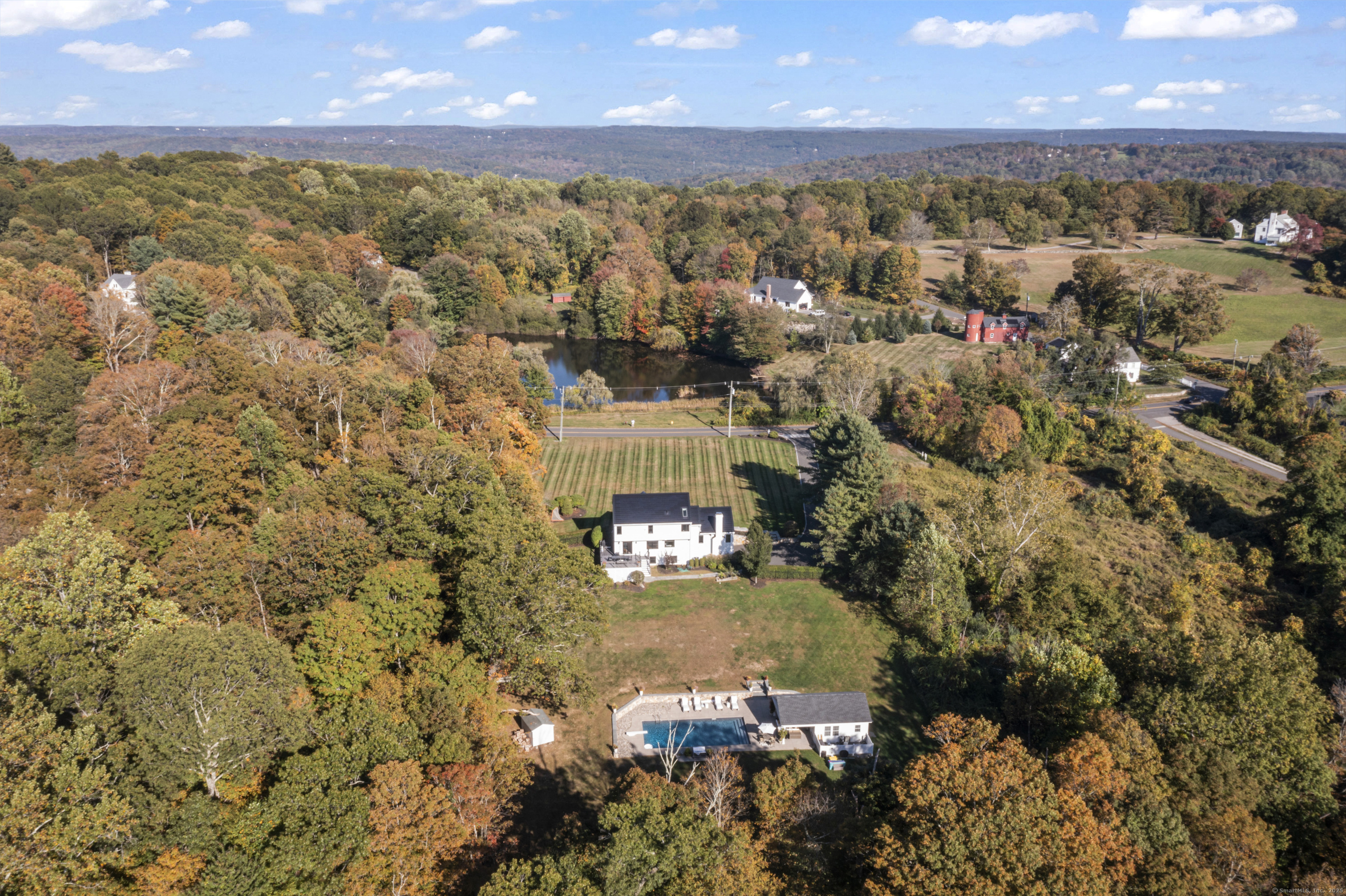 40 Great Ring Road Newtown, CT 06482 - Photo 4 of 39 an aerial view of residential building with parking space