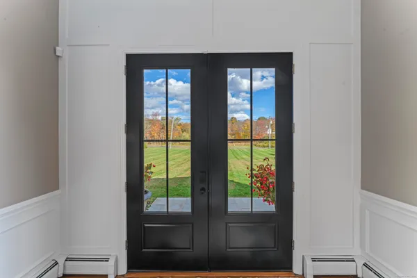 a kitchen with a table and chairs in it