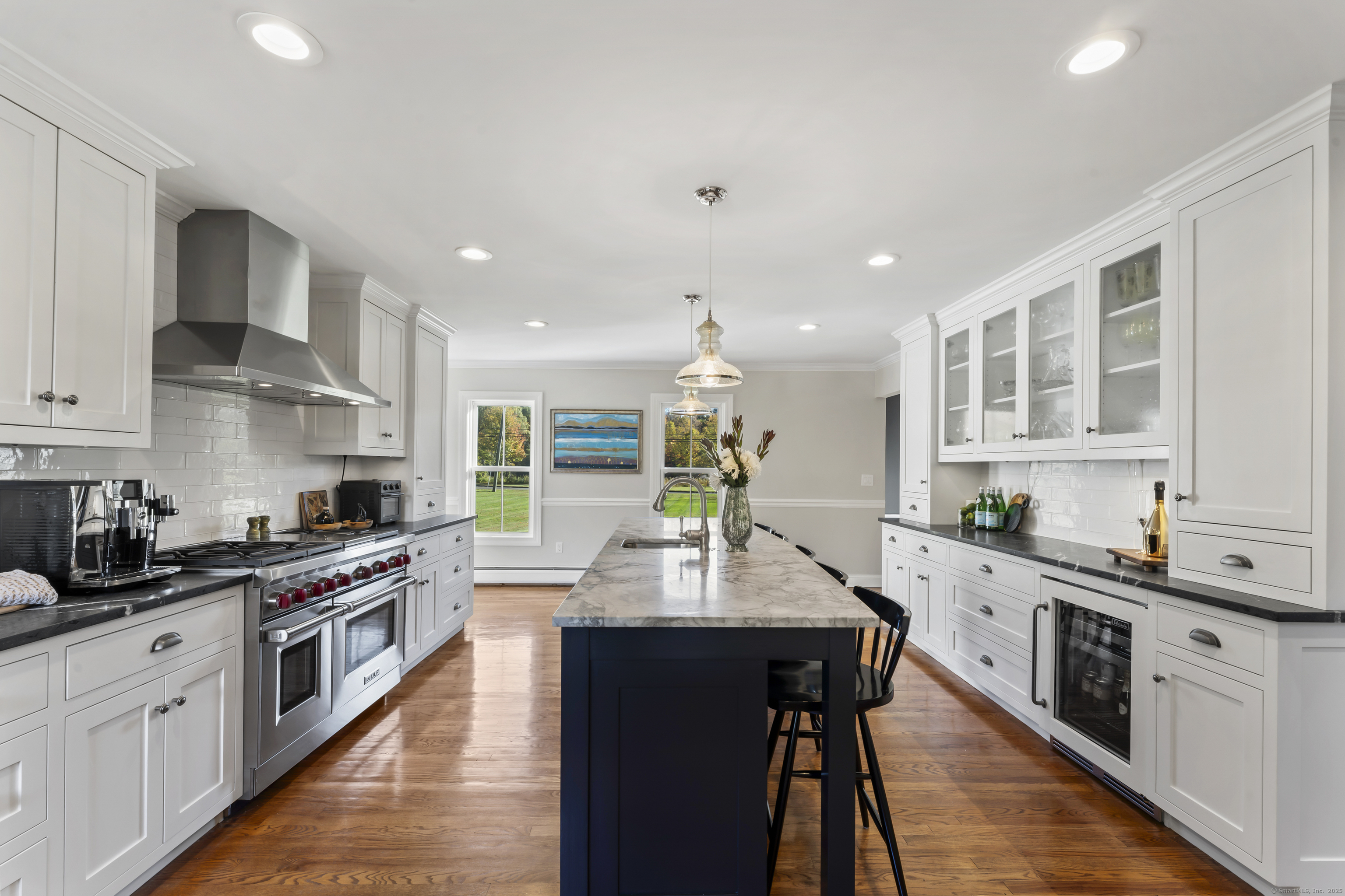 40 Great Ring Road Newtown, CT 06482 - Photo 9 of 39 a large kitchen with stainless steel appliances granite countertop a lot of counter space and wooden floors