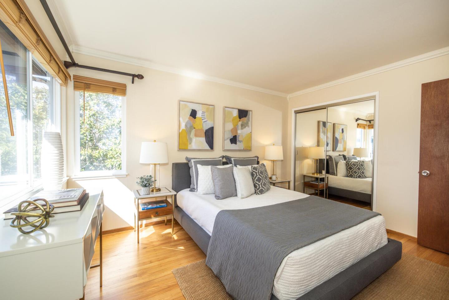 1420 Crespi Drive Pacifica, CA 94044 - Photo 16 of 48 a bedroom with a bed and wooden floor