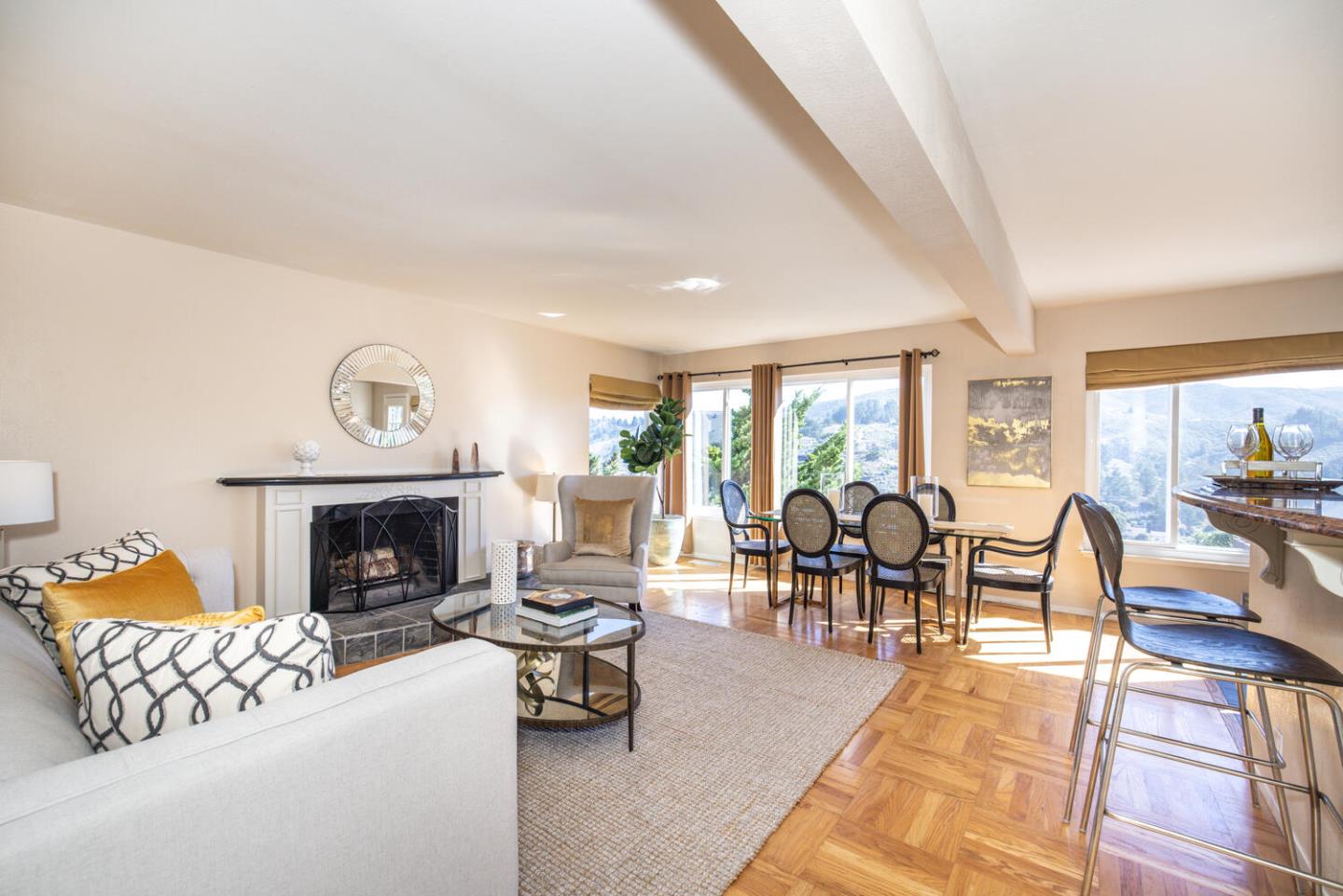 1420 Crespi Drive Pacifica, CA 94044 - Photo 19 of 48 a living room with furniture fireplace and a table