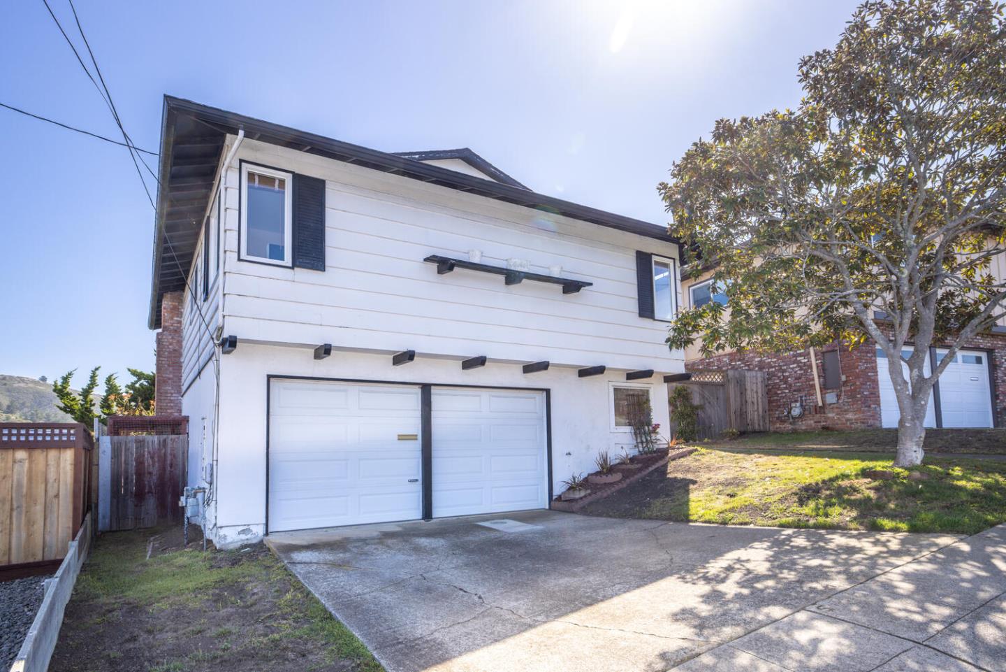 1420 Crespi Drive Pacifica, CA 94044 - Photo 2 of 48 a view of a house with swimming pool in front of it