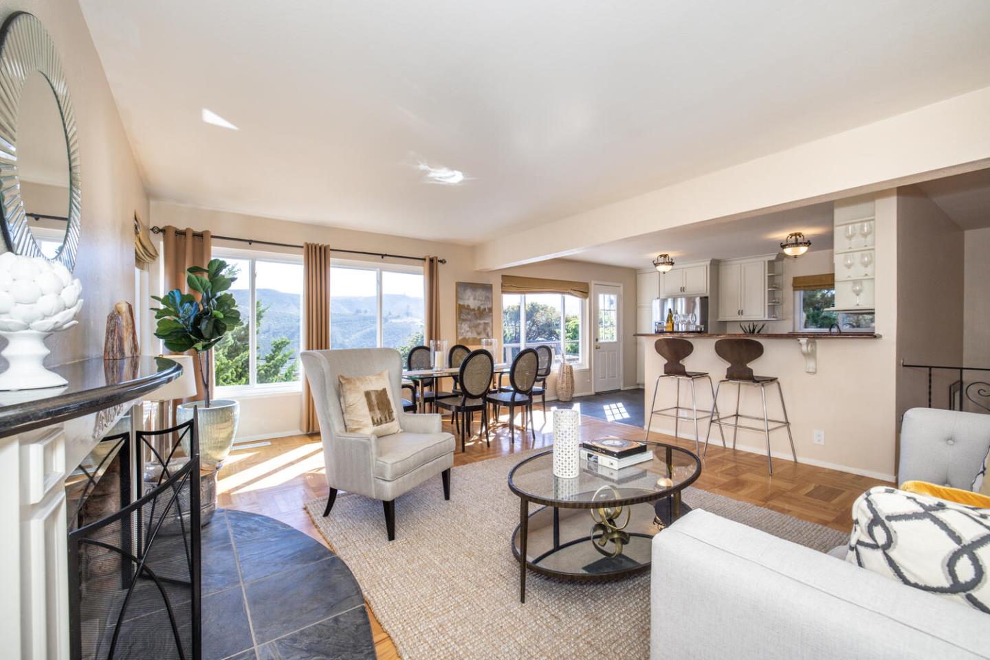 1420 Crespi Drive Pacifica, CA 94044 - Photo 22 of 48 a living room with furniture and a table